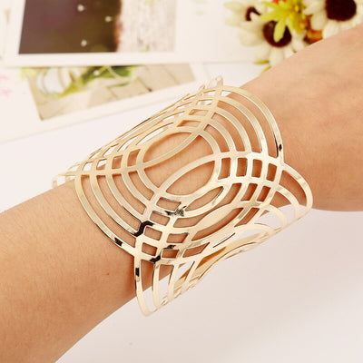 Brazalete redondo geométrico de puño ancho para mujer, brazalete abierto hueco de aleación de Color dorado y plateado para mujer, joyería de fiesta a la moda